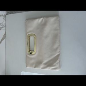Cream and gold clutch